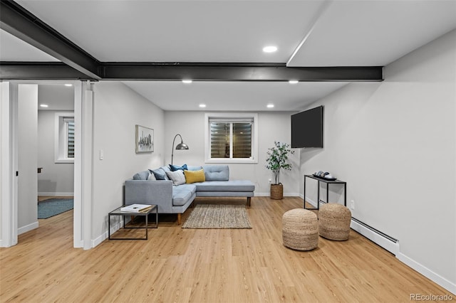2684 Taft Ct, Lakewood, CO 80215 - living room featuring a baseboard heating unit, light wood-style floors, baseboards, and recessed lighting