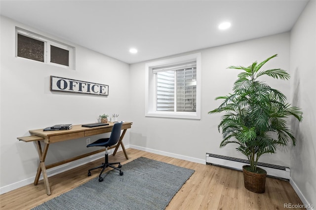 2684 Taft Ct, Lakewood, CO 80215 - office area featuring wood finished floors, baseboards, a baseboard radiator, and recessed lighting