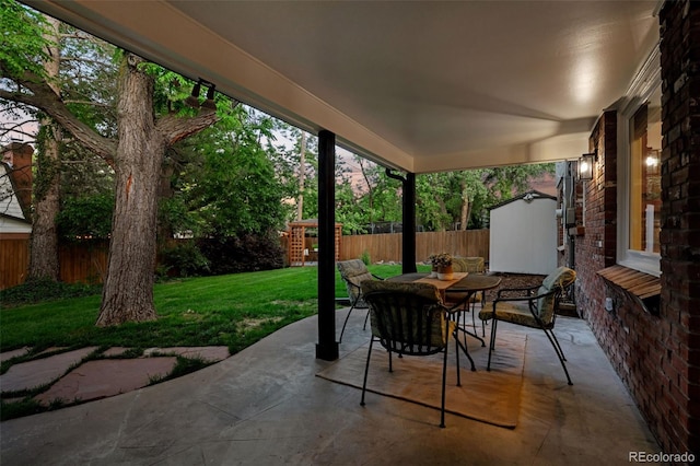 2684 Taft Ct, Lakewood, CO 80215 - view of patio / terrace with outdoor dining area and a storage shed