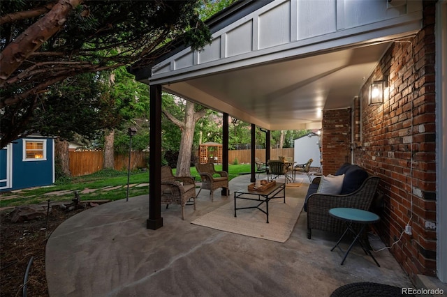 2684 Taft Ct, Lakewood, CO 80215 - fenced backyard featuring a patio and outdoor dining area