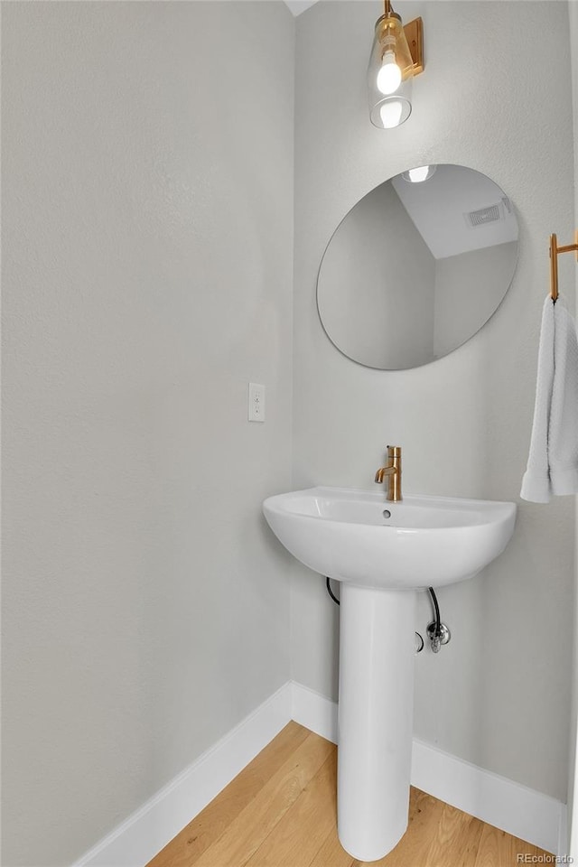 bathroom featuring hardwood / wood-style floors