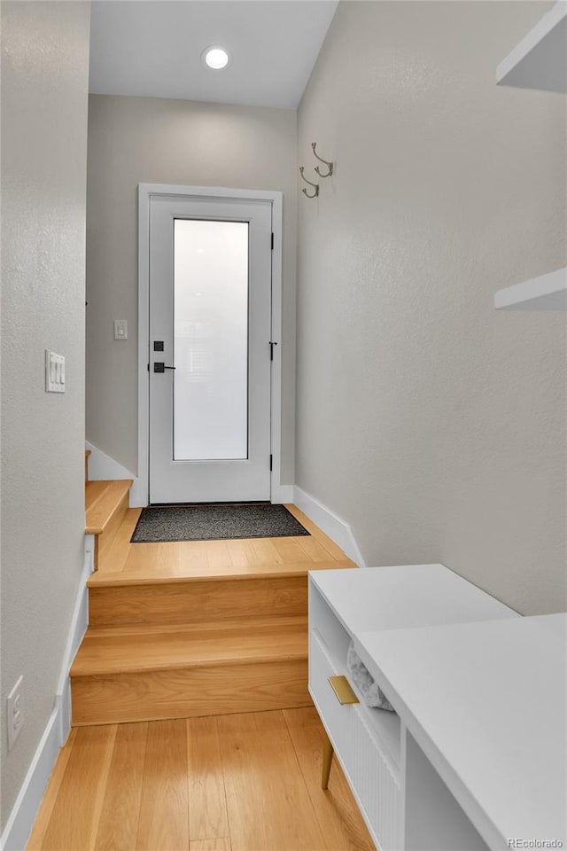 doorway to outside featuring light hardwood / wood-style flooring