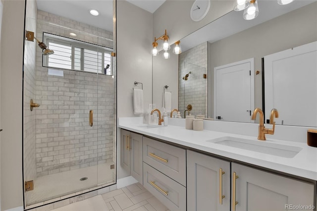 bathroom featuring tile patterned flooring, walk in shower, and vanity