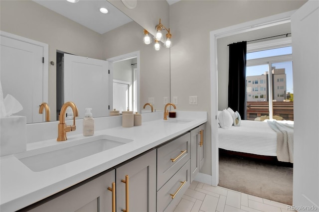 bathroom with vanity and tile patterned flooring