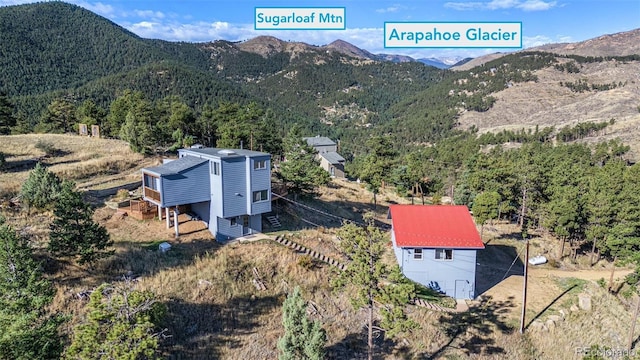 319 Camino Bosque, Boulder, CO 80302 - view of mountain backdrop with a forest