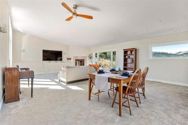 319 Camino Bosque, Boulder, CO 80302 - dining space featuring ceiling fan, light colored carpet, and a fireplace