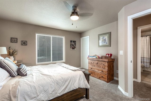 carpeted bedroom featuring ceiling fan and baseboards
