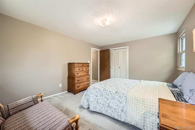 3150 Lane Ct, Boulder, CO 80305 - bedroom with light carpet, baseboards, and a closet