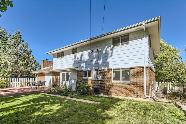 3150 Lane Ct, Boulder, CO 80305 - back of house with brick siding and a wooden deck