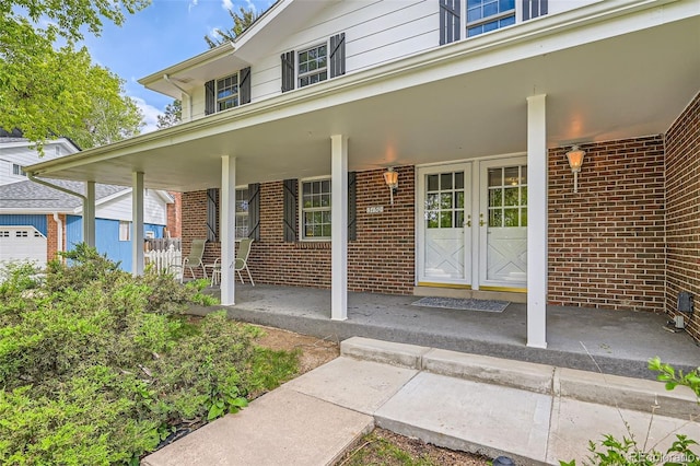 3150 Lane Ct, Boulder, CO 80305 - property entrance featuring brick siding and a porch
