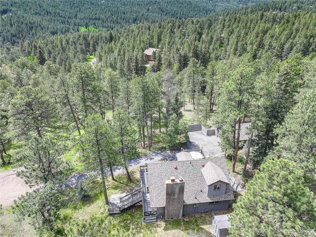 30221 Marge Ln, Evergreen, CO 80439 - view of subject property featuring a heavily wooded area