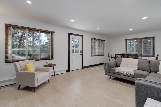 30221 Marge Ln, Evergreen, CO 80439 - living area with recessed lighting, a baseboard heating unit, and light wood-type flooring
