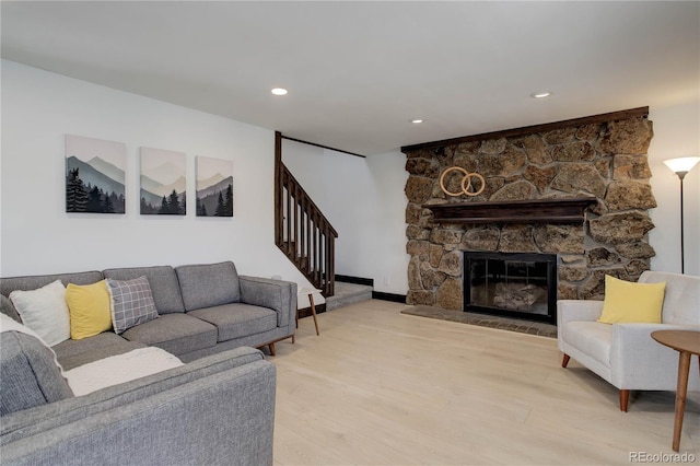 30221 Marge Ln, Evergreen, CO 80439 - living area with stairs, wood finished floors, recessed lighting, and a fireplace