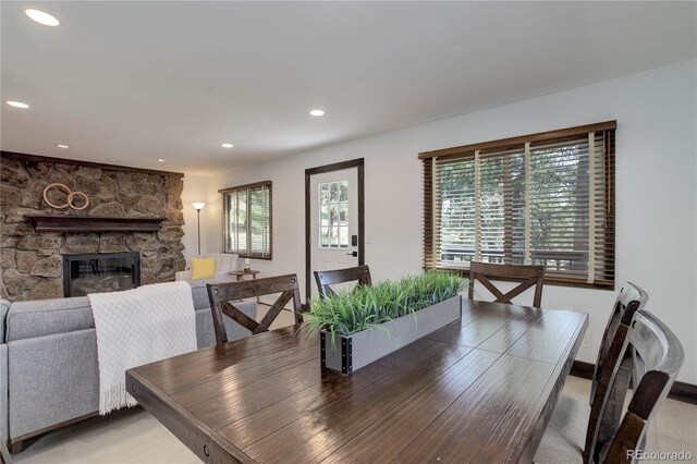 30221 Marge Ln, Evergreen, CO 80439 - dining space featuring recessed lighting and a fireplace