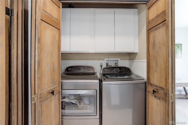30221 Marge Ln, Evergreen, CO 80439 - washroom with washing machine and dryer and cabinet space