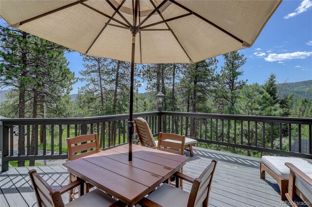 30221 Marge Ln, Evergreen, CO 80439 - deck with outdoor dining area