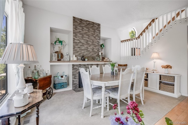 11760 Eudora Ct, Thornton, CO 80233 - dining area featuring wood finished floors and stairs