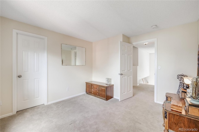 11760 Eudora Ct, Thornton, CO 80233 - bedroom featuring light colored carpet, baseboards, and a textured ceiling