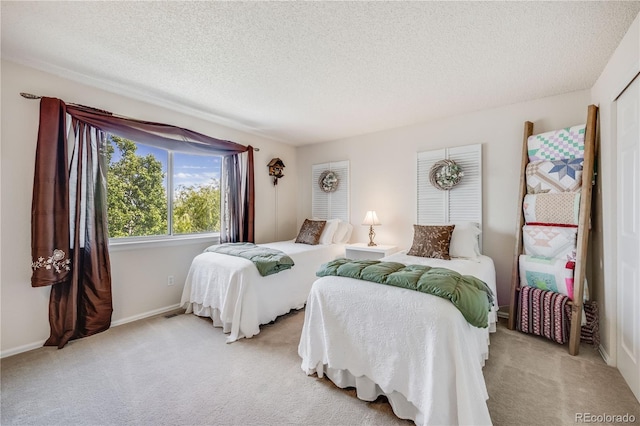 11760 Eudora Ct, Thornton, CO 80233 - bedroom with light carpet, a textured ceiling, and baseboards