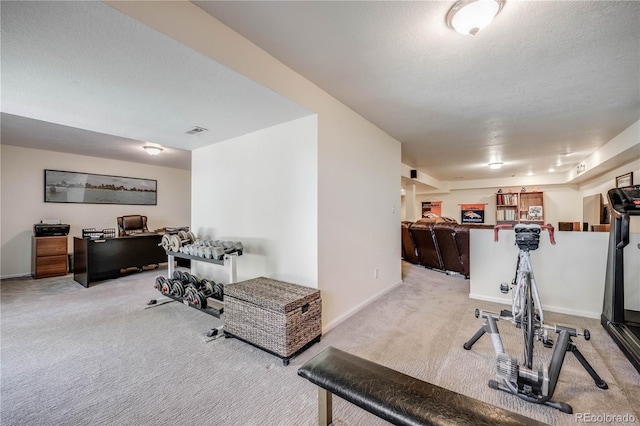 11760 Eudora Ct, Thornton, CO 80233 - workout area featuring carpet, baseboards, and a textured ceiling