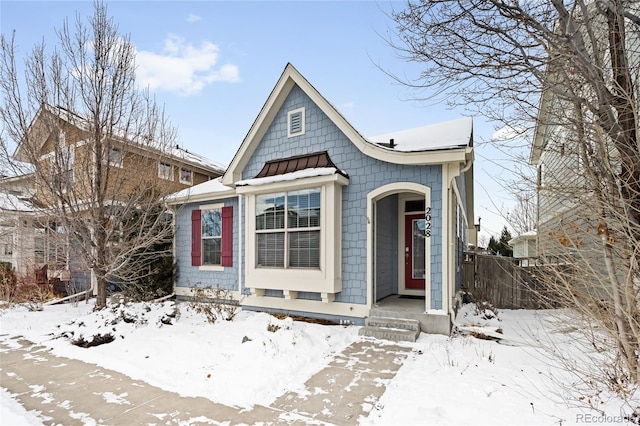 view of front of property featuring a standing seam roof and metal roof