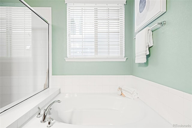 full bath featuring a garden tub