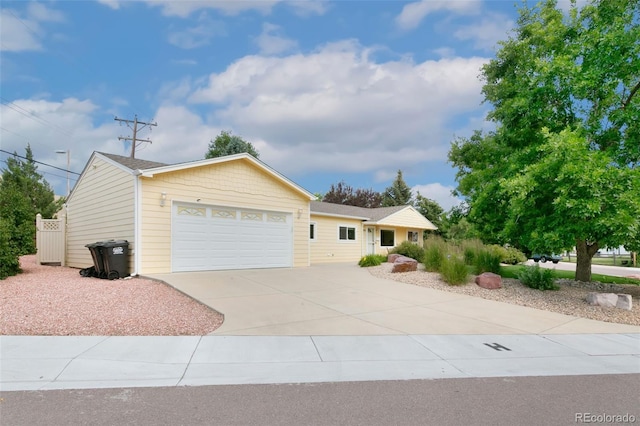 4803 N Weber St, Colorado Springs, CO 80907 - single story home featuring an attached garage and concrete driveway