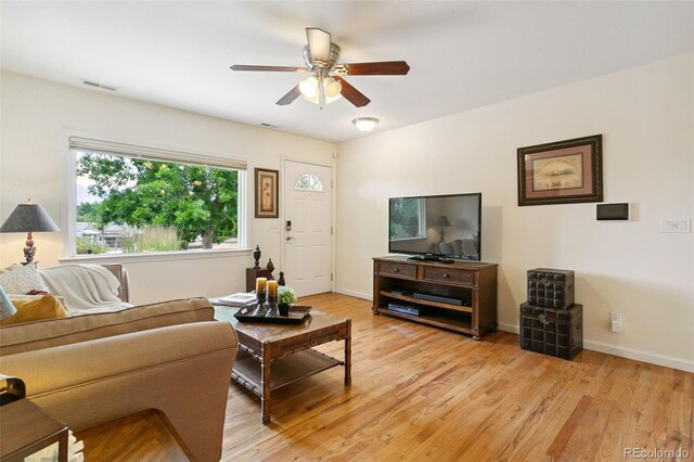 4803 N Weber St, Colorado Springs, CO 80907 - living area featuring a ceiling fan and light wood finished floors
