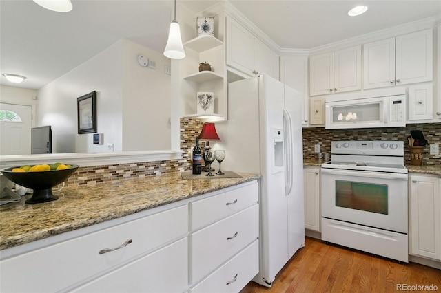 4803 N Weber St, Colorado Springs, CO 80907 - kitchen with white appliances, open shelves, backsplash, and white cabinetry