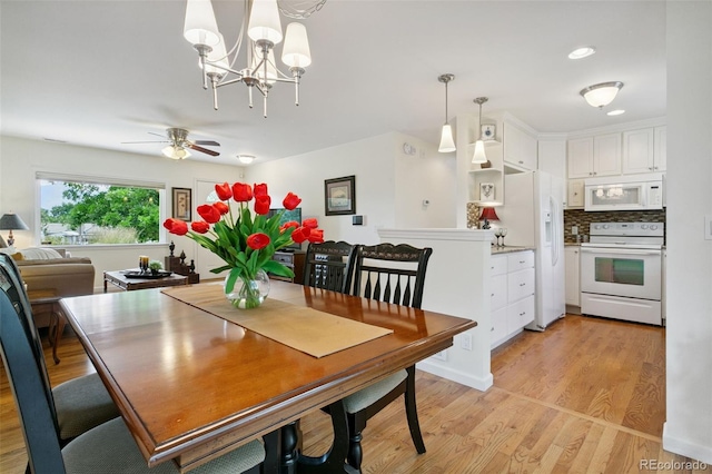 4803 N Weber St, Colorado Springs, CO 80907 - dining room featuring light wood-style floors, a chandelier, a ceiling fan, and recessed lighting