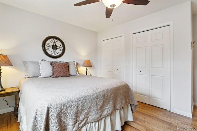 4803 N Weber St, Colorado Springs, CO 80907 - bedroom with two closets, light wood-style flooring, and a ceiling fan