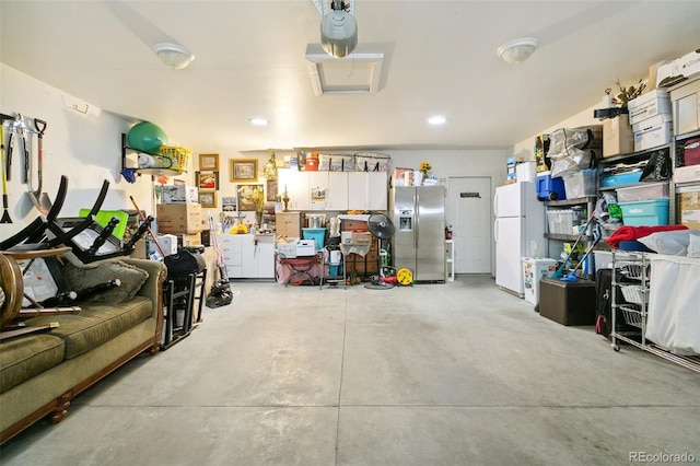 4803 N Weber St, Colorado Springs, CO 80907 - garage with stainless steel refrigerator with ice dispenser, freestanding refrigerator, and recessed lighting
