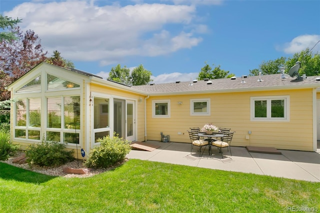 4803 N Weber St, Colorado Springs, CO 80907 - back of house with a patio, a sunroom, and a yard