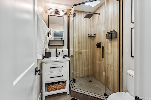 249 E Coyote Ct, Silverthorne, CO 80498 - full bath featuring a shower stall, vanity, and tile patterned floors