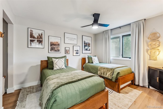 249 E Coyote Ct, Silverthorne, CO 80498 - bedroom with wood finished floors and a ceiling fan