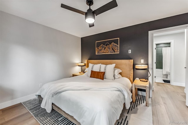 249 E Coyote Ct, Silverthorne, CO 80498 - bedroom with light wood finished floors and a ceiling fan