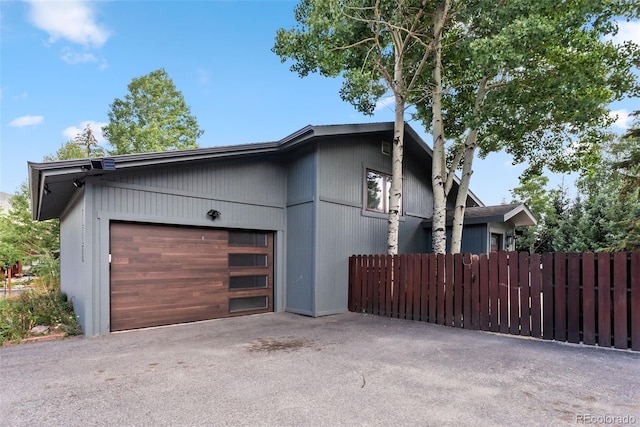 249 E Coyote Ct, Silverthorne, CO 80498 - view of property exterior with a garage and driveway
