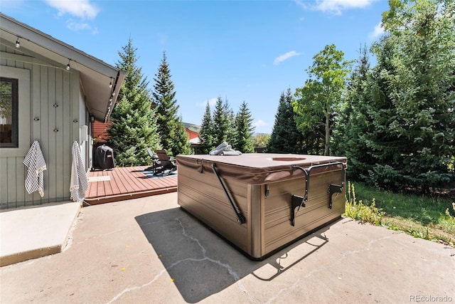249 E Coyote Ct, Silverthorne, CO 80498 - view of patio with a hot tub and a deck