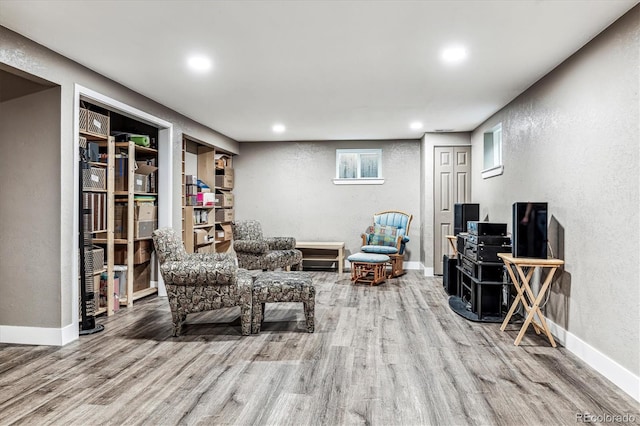 sitting room featuring wood-type flooring