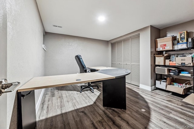 home office featuring hardwood / wood-style floors