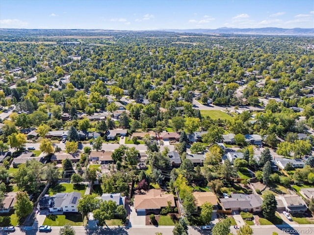 birds eye view of property featuring a mountain view