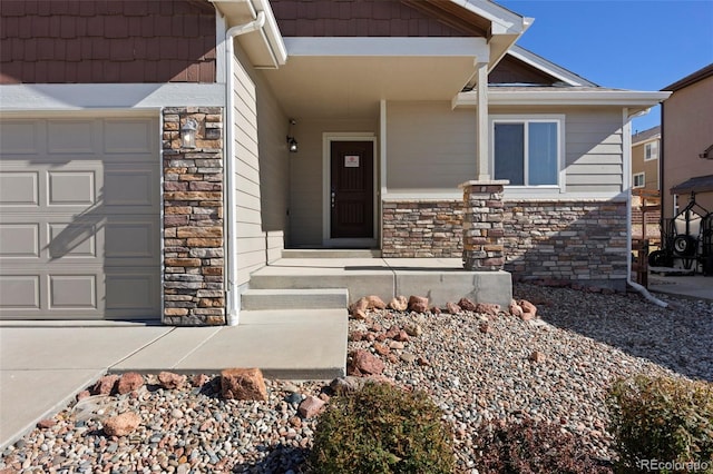 property entrance with a garage