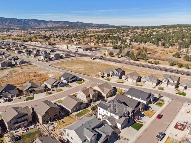 bird's eye view with a mountain view