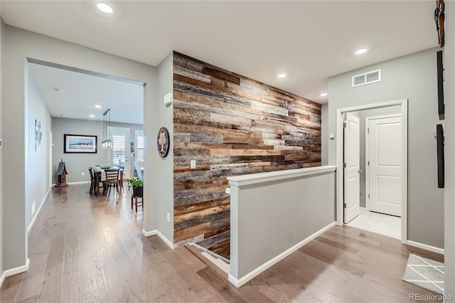 hall featuring wood-type flooring