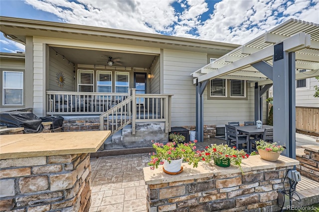 exterior space featuring ceiling fan, a patio, and covered porch