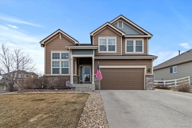 5404 Fawn Ridge Way, Castle Rock, CO 80104 - view of front of house featuring an attached garage, driveway, and brick siding
