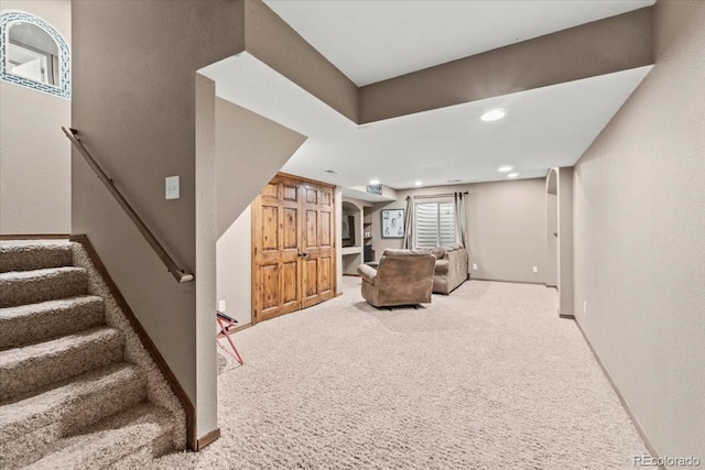 5404 Fawn Ridge Way, Castle Rock, CO 80104 - carpeted living area featuring stairway, baseboards, and recessed lighting
