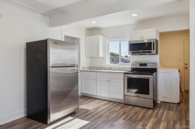 4401 W Mississippi Ave, Denver, CO 80219 - kitchen featuring appliances with stainless steel finishes, washer / clothes dryer, dark wood finished floors, white cabinetry, and recessed lighting