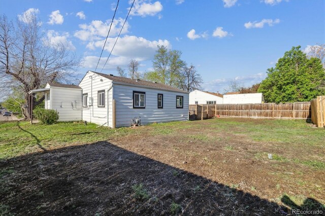 4401 W Mississippi Ave, Denver, CO 80219 - rear view of house featuring fence