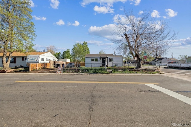 4401 W Mississippi Ave, Denver, CO 80219 - view of front of house with a fenced front yard